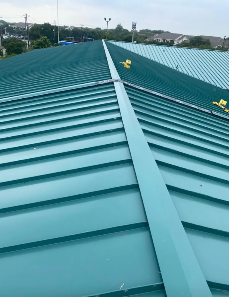 Green commercial metal roof ridge and valley for Metal Roof Repair in Rib Mountain